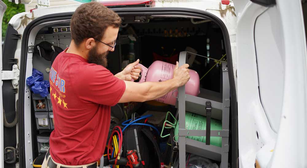 Tech Carrying AC Refrigerant